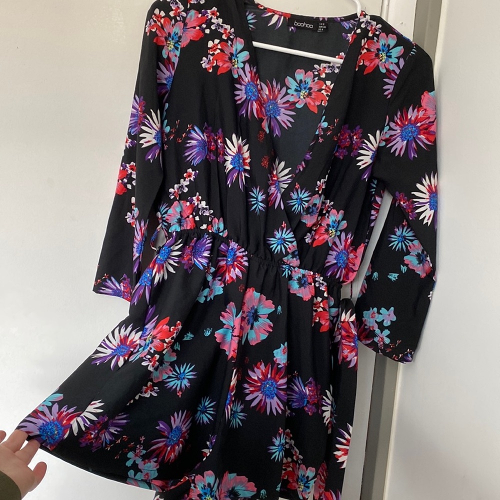 Romper floral.. absolutely love this but didn’t realize it was a petite.